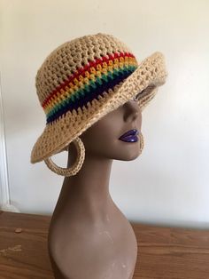 Hand Crochet women Sun Hat and Earring set.  Crochet Summer Sun Hat. Large brim can be folded in different ways fir a different look.  Its soft and comfortable. You can wear it with many outfits. It is very hip and chic, everyone should have one of these hats in their closet for good or bad hair day!  Care instructions: Machine washable on gentle cycle or can hand wash in cold, roll flat in towel to absorb most of the moisture. Lay flat to dry. Any questions, please contact me Adjustable Multicolor Cloche Hat For Beach, Summer Mini Hats Made Of Yarn, Adjustable Multicolor Wide Brim Cloche Hat, Bohemian Adjustable Beige Mini Hat, Bohemian Beige Adjustable Mini Hat, Adjustable Bohemian Beige Mini Hat, Bohemian Yarn Bucket Hat Adjustable, Bohemian Adjustable Yarn Bucket Hat, Multicolor Brimmed Cloche Hat