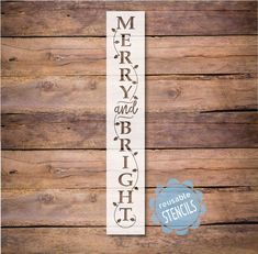 merry and bright wooden sign on wood planks with the words merry and bright written in cursive font