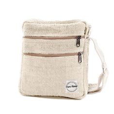 Product Description The Beige Hemp Crossbody Bag is for the urban man or woman who wants to be stylish, eco-conscious, and look trendy while on the go. This over the shoulder bag features 4 zippered pockets. Our crossbody sling bag doesn't just look good-- it also has great features for the Environmentally friendly person. It's made from 100% hemp, its eco-conscious, sustainable and water repellent, making it one of a kind in functionality and style: plus its vegan! Isn't your new bag tailored to suit you like no other? Get yourself a cross body purse that is perfect for any occasion! Take to festivals, concerts, or to use as your everyday side bag. So stylish and unique it will go with any outfit! Features Handmade in Nepal Vegan, Eco-Friendly and Fair Traded Machine wash safe: (Cold) Lar Over The Shoulder Bag, Over The Shoulder Bags, Side Bag, Side Bags, Neutral Beige, Eco Conscious, The Urban, Crossbody Purse, New Bag