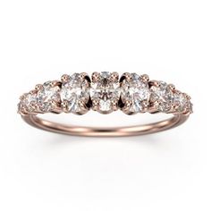 three stone diamond ring in rose gold