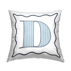 a pillow with the letter d on it