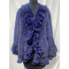 Knitted Mink Jacket / Bolero Blue (90054). Fur Sample Sale Size: 8/10/12 Button Up Front, 2 Pockets Length: 27 Inch From The Base Of The Collar To The Bottom Of The Hem Bust: 50 Inch Measured From Far Left Side To Far Right Side Underneath Armpit From The Inside Arms: 29 Inch From The Inside Of The Collar To End Of The Sleeve Sweep: 54 Inch From The Side To Side Along The Bottom Elegant Winter Knit Outerwear, Elegant Long Sleeve Knit Outerwear, Elegant Knit Outerwear For Fall, Elegant Blue Winter Sweater, Elegant Blue Wool Sweater, Luxury Blue Wool Sweater, Blue Wool Cardigan For Fall, Blue Wool Long Sleeve Cardigan, Elegant Blue Sweater For Fall