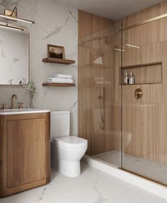 a bathroom with a toilet, sink and shower