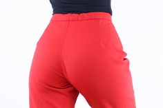 "Item Description This is such a cool pair of vintage high rise stirrup ski pants in a super fun bright red color. These are super comfy and such a great pop of color and pop of vintage style for a day out in the snow. They may not be as water repellent now as they once were, but with a thermal layer underneath they will be warm and you may actually be able to put water proofing spray on them if you are interested in them being a bit more water repellent. They also have the word \"stretch\" in t Retro Red Bottoms For Winter, Retro Fitted Winter Bottoms, Retro Fitted Bottoms For Winter, Retro Fitted Solid Color Bottoms, Fitted Red Bottoms With Belt Loops, Retro Fitted Red Pants, Vintage Red Fitted Bottoms, Red Fitted Vintage Bottoms, Vintage Stretch Red Bottoms