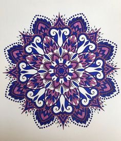 a drawing of a purple and white flower on a white paper with blue dots in the center