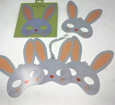 three bunny masks and one mask with ears