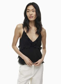 Flirty Camisole With Built-in Bra For Date Night, Chic Camisole With Built-in Bra For Brunch, Flirty Spaghetti Strap Tank Top For Summer, Summer Camisole With Built-in Bra And Ruffled Straps, Elegant Top With Ruffle Hem For Date Night, Spring Camisole For Night Out, Flirty Tops With Spaghetti Straps And Built-in Bra, Flirty Ruffled Camisole Top, Flirty Ruffled Cami Tank Top