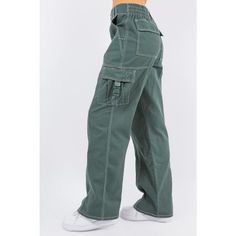 A must-have! Made with 100% cotton fabric, our Carmen Cargo Pants feature a contrast stitch, smocked waist, straight-leg silhouette and multiple pocketing details, including hip, back and side pockets. These trendy cargo pants are a timeless dark green hue! Materials: 100% Cotton Hip, Back & Side Pockets 2 Button/Zippered Closure Color: Dark Green Shown in Size Small Approximate Inseam Measurement: 30 in Green Jeans With Multiple Pockets For Streetwear, Utility Cargo Pants With Contrast Stitching For Streetwear, Green Utility Parachute Pants, Baggy Green Pants With Multiple Pockets, Baggy Green Cargo Pants With Hip Pockets, Green Baggy Cargo Jeans With Hip Pockets, Baggy Green Cargo Style Jeans, Baggy Green Cotton Cargo Jeans, Baggy Green Utility Cargo Pants