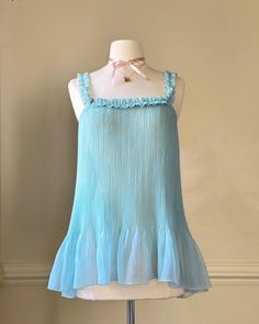 - Victoria's Secret 2006 babydoll sheer minty turquoise blue slip dress featuring crinkled fabric with ruffled sleeves Listed at $690, but I'm open to offers! Interested in bidding? Head over to my Instagram @dokidoki.vintage to join in! 🎬✨Feel free to message me with your best offer--let's make a deal! 💬 Ships quickly Trusted seller No returns or refunds - rosette adorned; scooped back; style worn by Sabrina Carpenter- size XS- lovely condition with no flaws 🤍 Size of mannequin: size 2 - 4 Grab it before it's gone! 💖 Babydoll Sleep Dress, Sabrina Carpenter Babydoll Dress, 60s Babydoll Dress, Blue Baby Doll Dress, Babydoll Dress Outfit, Vintage Babydoll Dress, Blue Babydoll Dress, Sabrina Carpenter Style, Blue Slip Dress