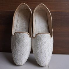 30% OFF on all items and get 10% EXTRA Discount on Purchase THREE or MORE items COUPON CODE-UPBEATSAVINGS . Handmade Jutti Size:- US closure:- pull on Color:- White Material:- Cloth Made:- Handmade Sole:- Rubber Can Be Personalized:- Yes Etsy's vibrant collection of men's ethnic shoes seamlessly blends traditional craftsmanship with contemporary styles, offering a diverse range of loafers, slip-ons, leather slippers, and sandals that embody the rich cultural heritage of various regions. From Khu Formal Cream Flat Wedding Shoes, White Closed Toe Loafers, Festive White Wedding Shoes With Gota Work, White Slip-on Wedding Shoes, Traditional White Flat Wedding Shoes, White Flat Wedding Shoes For Festive Season, Festive White Flat Wedding Shoes, Festive Flat White Wedding Shoes, White Wedding Shoes With Gota Work