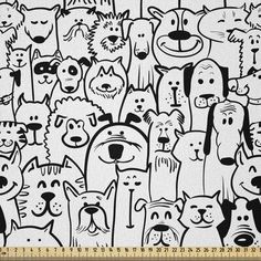 a black and white drawing of many dogs