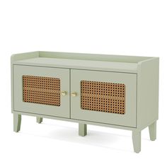 a green cabinet with two doors and wicker panels on the front, against a white background