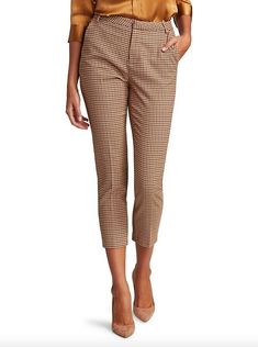 Description: new with tags women's L'Agence Ludivine tan burgundy houndstooth crepe cropped trousers, zip/button/hook and bar closure on flat front, belt loops, front slash pockets, back wallet pockets, size 4. Details/Measurements fabric: 65% polyester/33% rayon/2% spandex - pocket lining - 100% polyester waist (flat lay, across front) - 15" hips (flat lay, across front) - 19" rise - 11" inseam - 26.5" leg opening - 13" Customer satisfaction is my priority, so please read below and ask question Chic Houndstooth Pants For Workwear, Brown Houndstooth Bottoms For Workwear, Brown Houndstooth Bottoms For Work, Trousers Pants, Cropped Trousers, Trouser Pants, Flat Lay, Capri Pants, Pajama Pants