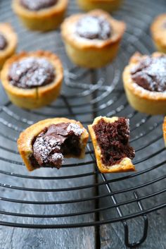 chocolate cupcakes cooling on a wire rack