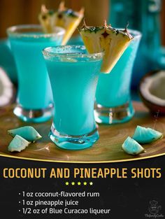 two blue cocktails with pineapple garnish on the rim and text coconut and pineapple shots