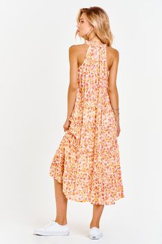 Multi-tiered skirt midi dress, v-neck finished sleeveless with neck ruffle & tassles in contemporary floral print. Blooming floral showcasing life's optimism, always rosy & just cheered! Multi print woven on relaxed fit.Body length from HPS: 46", Sleeve lenght: N/A, Bust: 42" (Size Small) 100% RAYON Machine wash cold, Line dry Imported Summer Pink Tiered Skirt Dress, Summer Tiered Skirt Dress In Pink, Pink Tiered Skirt Summer Dress, Spring Sleeveless Midi Dress With Ruffle Hem, Pink Tiered Maxi Dress For Summer, Pink Tiered Skirt Maxi Dress For Summer, Pink Tiered Skirt Dress, Pink Midi Sleeveless Dress For Summer, Casual Pink Tiered Maxi Dress