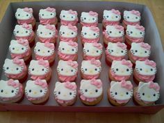 hello kitty cupcakes are arranged in a box