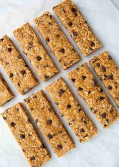 six bars of granola and chocolate chips laid out on top of each other