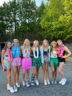 a group of young women standing next to each other