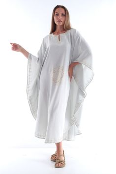 Discover the perfect blend of style, comfort, and elegance with our Handmade Long Caftan Robe. Crafted meticulously from 100% cotton, this versatile piece is designed to be your go-to beachwear as well as a comfortable long dress for casual outings. The breathable cotton fabric ensures you stay cool and comfortable, whether you're lounging by the beach or enjoying a day out. Our Handmade Long Caftan Robe is not just about comfort; it's a statement piece that reflects exquisite craftsmanship. Eac Long Kaftan Dress, Chic Evening Dress, Long Kaftan, Cotton Long Dress, Dress Handmade, By The Beach, Kaftan Dress, Stylish Gifts, Dress 100