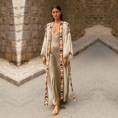 Step up your boho style game with our gorgeous kimono. Whether you wrap it around as a kimono dress, wear it out as a duster, or simply lounge in it at home, this kimono is sure to make a statement. With its delicate fabric and tribal pattern, this kimono robe is perfect for festival outfit, bachelorette party, or just everyday life. So grab yours today and start turning heads! Details: ༄ Boho style ༄ Maxi length ༄ Material: soft & airy rayon cotton ༄ Care: machine washable Perfect Mother's Slip Dress With Kimono Outfit, Kimono Wedding Guest Outfit, Long Kimono Outfit With Dress, Long Kimono Outfit Dressy, Maxi Kimono Outfit, Kimono Over Dress, Boho Kimono Outfit, Plus Size Beach Wear, Silk Kimono Dress