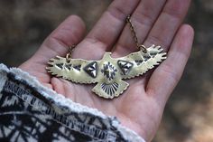 "This listing is for one hand stamped brass hawk necklace. Wear this bohemian necklace to show your affinity and love for all things natural, spiritual, and sky-bound. It is a powerful and eye-catching piece. - Hawk is made from 18 gauge brass sheet metal. This is a sturdy piece- it is not flimsy. - Pendant measures 3\" by 1 1/4\" (75mm by 30mm) - Chain in photo measures 16\" from end to end, but can be lengthened to your preference. Choose at check-out! Also, I can suspend it on black or brown Bohemian Brass Stamped Jewelry, Bohemian Stamped Brass Jewelry, Bohemian Hand Stamped Necklace Gift, Bohemian Hand Stamped Necklace For Gift, Handmade Southwestern Gold Necklace, Southwestern Handmade Gold Necklace, Southwestern Style Gold Necklace For Gift, Artisan Stamped Brass Jewelry, Stamped Bronze Brass Necklace