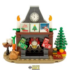 a lego christmas scene with a fireplace and presents