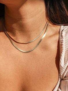 Our Athena Herringbone Necklace is a luxe essential. There is an option of a 3mm or 4mm thick chain and features a flat gold filled snake chain style. This piece adds a minimal and timeless touch when layering. Its tarnish resistant finish adds the perfect touch of sparkle to you look! Embodying the latest trend, this necklace is truly a must-have staple for your jewelry collection. * Single Herringbone Necklace (choose between a 3mm or 4mm chain) * Gold Filled * 3mm Length: 16" + 1" extender (t Trendy Herringbone Necklace For Everyday, Minimalist Double Chain Herringbone Necklace For Everyday, Minimalist Double Chain Herringbone Necklace, Everyday Gold Chain Herringbone Necklace, Minimalist Herringbone Necklace For Everyday, Minimalist Everyday Herringbone Necklace, Everyday Minimalist Herringbone Necklace, Dainty Snake Chain Necklace For Everyday, Everyday Jewelry Gold