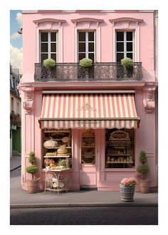 a pink building with a striped awning