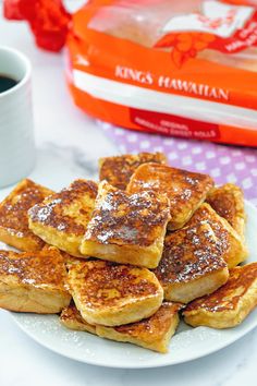 some french toast on a plate with coffee