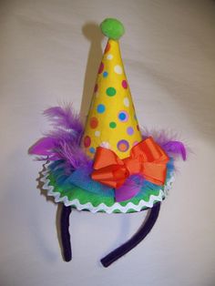 a party hat that is on top of a headband