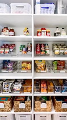 an organized pantry filled with lots of food and storage bins on the bottom shelf