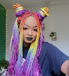 edith from the band mmata with her rainbow colored box braids! Pride Box Braids, Rainbow Braids For Black Women, Split Dye Box Braids, Rainbow Box Braids, Neon Box Braids, Purple And Green Braids For Black Women, Galaxy Braids For Black Women, Pastel Box Braids, Colorful Box Braids