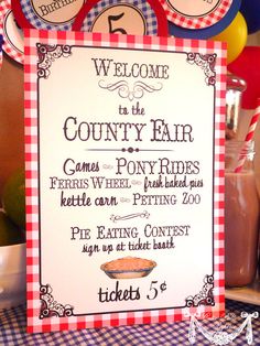 a sign that says welcome to the country fair