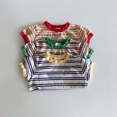 - Multi stripe tee, short sleeve- Made in South KoreaModel : 3'8" 37.48lbs wearing a size “3-4y (m)”. CareMachine wash cold with like colors.Do not Bleach. Hang dry.Cool iron if needed. Do not dry clean. Eclectic Clothes, Silly Clothes, Cool Kids Clothes, Mom Hats, Baby Fits, Stripe Tee, Kids Wardrobe, Striped T Shirt