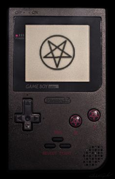 an old nintendo game boy with a pentagramil on it's display screen