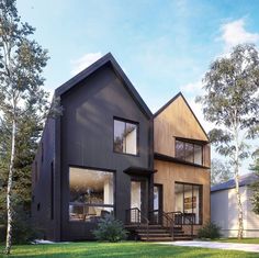 a modern house with black siding and wood trimming on the front, surrounded by green grass