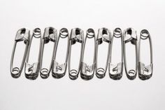 four metal handles on a white background