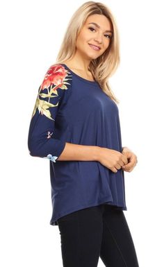 Update your fashion rotation in our trendy floral top for Women. This cute and casual top features 3/4 length floral sleeves and a solid blue center. Created with double brushed fabric, it is extremely soft and comfy. A designer quality shirt every Woman loves to wear. Our blue top for Women is perfect worn alone or layer under a cardigan, duster or jacket. This top also pairs perfectly with any of our buttery soft leggings or jeans. A casual top that is versatile for traveling, running errands