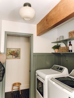 a washer and dryer in a small room