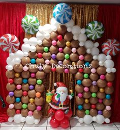 a christmas decoration with balloons and candy canes