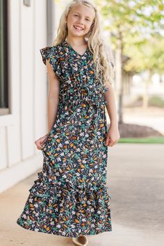 How cute is this midi dress for her?! We love that flowy fit and we know she will too! Plus, that floral print features some fab fall hues! V-neckline Cap sleeves Floral print No stretch Lennox is wearing the medium.