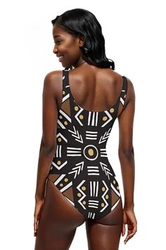 Make a bold statement on the beach with our African Black Bogolan Print Swimsuit. Explore exotic charm and elegance. Fitted Bold Print Swimwear For Vacation, Brown One-piece Swimwear For Beach, Fitted Brown Swimwear For Festival, Black Printed One-piece Swimsuit For Beach Season, Black Printed One Piece For Beach Season, Black Printed One-piece Swimsuit For Vacation, Black Printed One-piece Swimwear For Vacation, Printed Black One-piece For Beach Season, Black Printed Beachwear One-piece