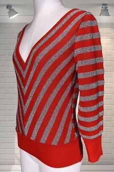 "Vintage BUS STOP Chevron disco jumper. Plunge neckline, silver and red knit - in FABULOUS condition - Scarce. Approx modern day UK 8/10 Chest:  up to 34\" Waist:  up to 28\" Shoulder to cuff:  19\" Nape to hem:  19.5\" Please ask if you have any questions :)" Retro Red Crew Neck Top, Vintage Red Top With Ribbed Cuffs, Retro Red Bag With Zipper Closure, Vintage Red Top With Button Closure, Vintage Bus, Vintage Single-breasted Red Outerwear, Plunge Neckline, Absolutely Fabulous, Bus Stop