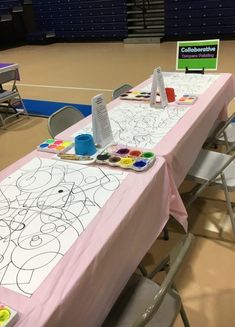 the table is set up for an art class