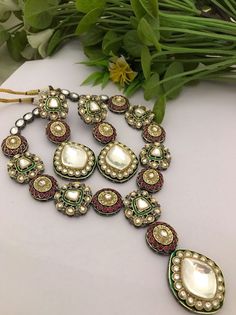 Most eligible gift for someone you love and someone very special for you. Long Kundan Polki Necklace with matching Earrings Suitable for all kind of outfits like Kurtis, lehanga and Sarees  Best gift for your loved ones. Best gift for her Birthday. Necklace : 1 Earrings : 1 Pair Diamond Kundan Necklace Gift, Elegant Multicolor Hand Set Bridal Sets, Traditional Diamond Jewelry Sets For Gifts, Fusion Style Hand Set Jewelry For Gifts, Fusion Style Hand Set Jewelry As Gift, Festive White Fusion Jewelry, Festive Fusion White Jewelry, Elegant Multi-stone Kundan Necklace For Wedding, White Fusion Jewelry With Meenakari