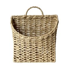 an empty wicker basket with handles on a white background