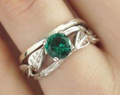 Emerald Leaf Engagement Ring Emerald Engagement Ring by Benati Green Emerald Ring With Brilliant Cut In Sterling Silver, Green Brilliant Cut Emerald Ring In Sterling Silver, Green Emerald Ring With Diamond Cut, Nature-inspired Green Emerald Ring For Anniversary, Nature-inspired Green Emerald Anniversary Ring, Nature-inspired Green Emerald Ring For May Birthstone, Forest Ring, Leaves Ring, Engagement Ring Emerald