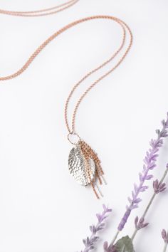 A fun design to compliment the Rosebud Collection, perfect for those who value versatility. Featuring a rose gold chain with a unique hill tribe fine silver pendant, this design can be worn at 38.5" as a longer layer, or simply use the sterling silver lobster claw clasp to create a shorter design resting at 19.75" Rose Gold (Lead & Nickel Free) Hill Tribe Fine Silver 19.75 or 38.5" convertible with sterling silver lobster claw clasp We hand select our natural materials, thus there may be slight Sterling Silver Rose Gold Necklace With Large Pendant, Artisan Rose Gold Sterling Silver Jewelry, Rose Gold Lariat Necklace In Sterling Silver, Rose Gold Sterling Silver Lariat Necklace, Unique Sterling Silver Rose Gold Necklace, Unique Rose Gold Sterling Silver Necklace, Silver Hammered Copper Necklace, Handmade Sterling Silver Charm Necklace In Rose Gold, Handmade Rose Gold Charm Necklace In Sterling Silver