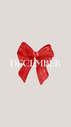 a red bow with the words december on it